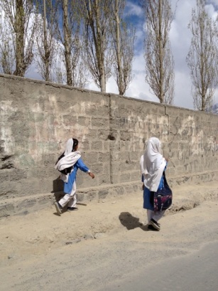 Young girls return home from school in Skardu, Baltistan. The blue kurta and white veil is a popular school uniform in Pakistan. April 2013. Photo by Kelsey L. Campbell 